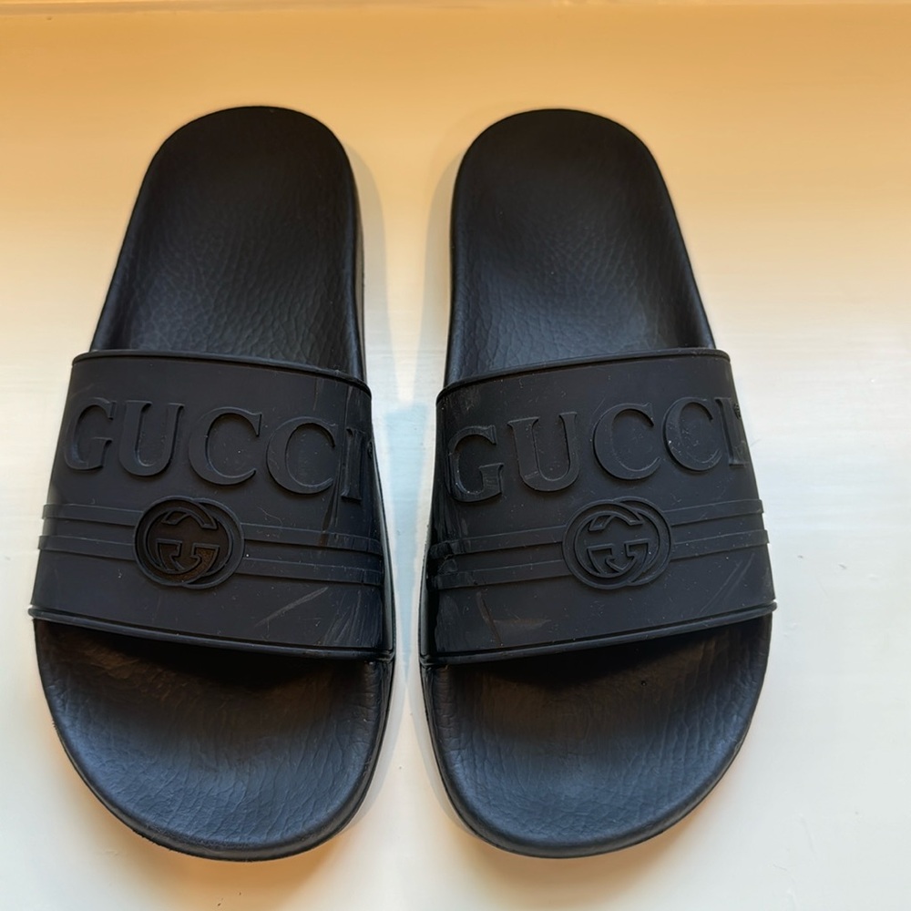 Authentic black rubber Gucci slides